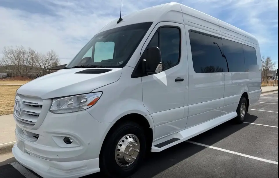 Greeley 16 passenger white Sprinter limo bus