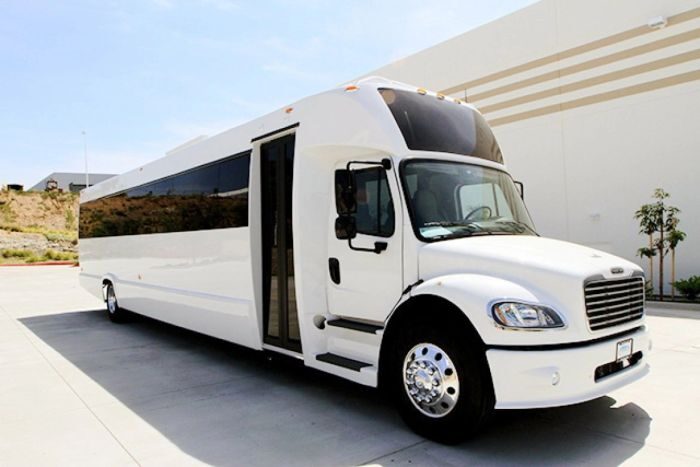 White limo bus – Woody Creek limo service